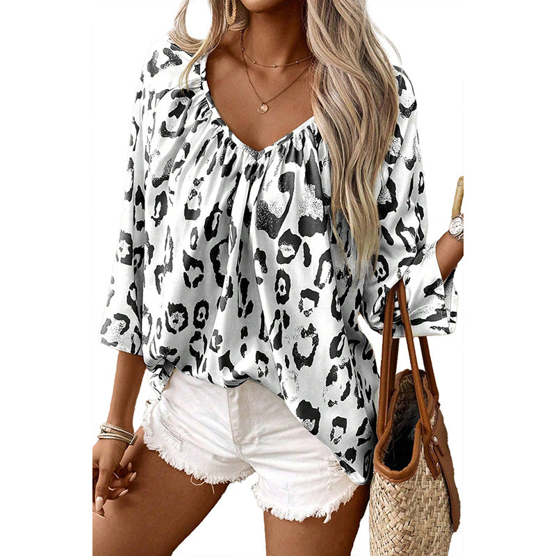 Women's blouse top with a relaxed fit and chic leopard print, size S