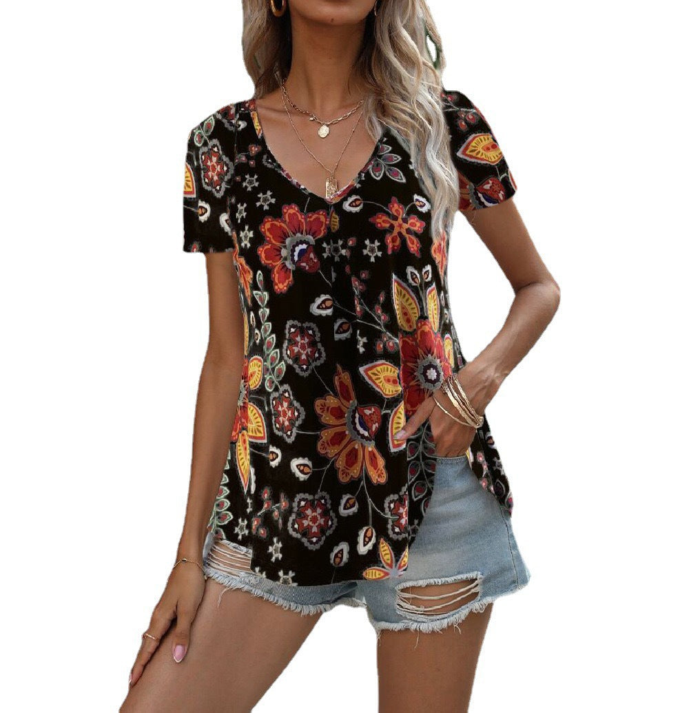 Women's floral top with deep V-neck and flowing cut, size
