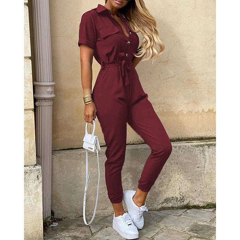 Women's figure-hugging short jumpsuit with button placket and adjustable belt, size S