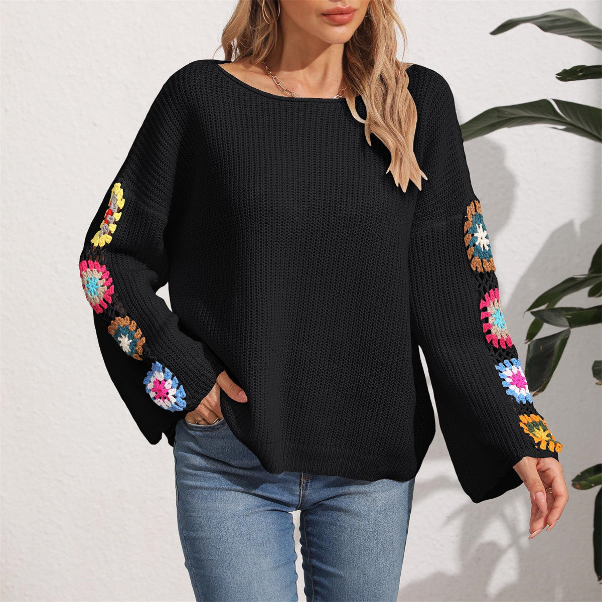 Women's elegant sweater with colorful crochet appliqués on the sleeves, size [size missing]