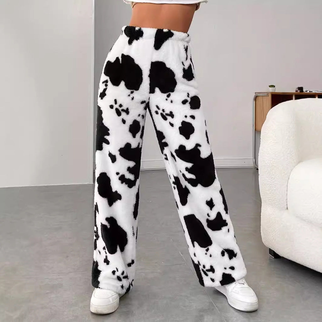 Women's fleece trousers in a trendy cow print, size
