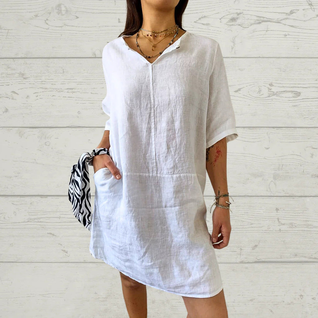 Women's lightweight linen dress with front button detail and side pockets, size