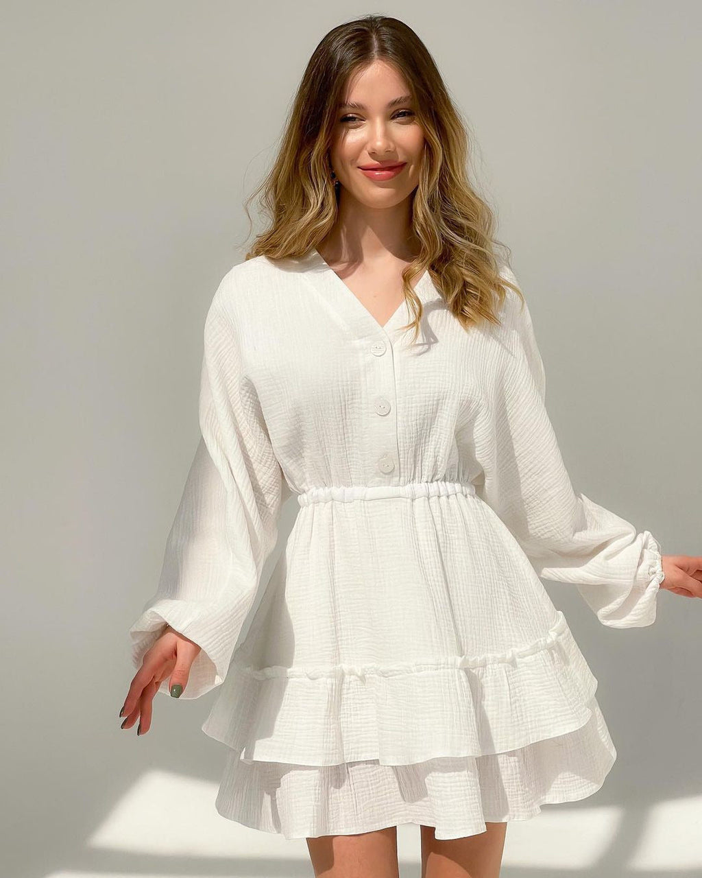 Women's casual babydoll dress with button details and voluminous sleeves, size [size missing]