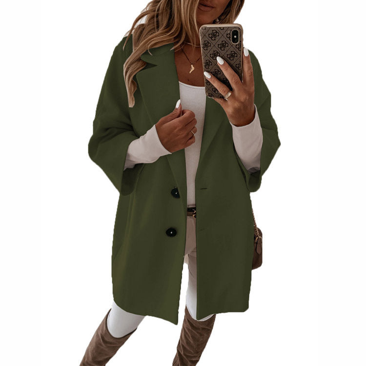 Women's oversized jacket with a modern cut and stylish button details, size [size]