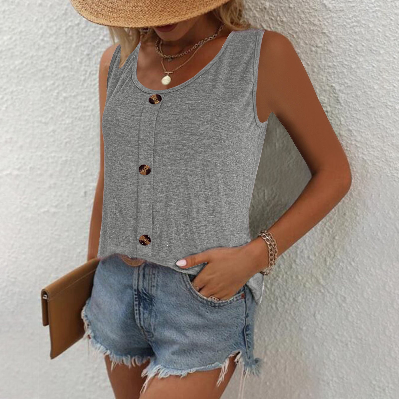 Women's sleeveless top with decorative button placket, size
