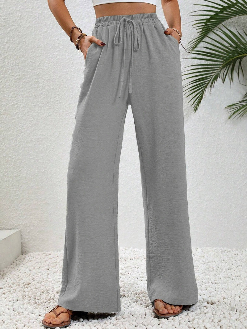 Women's casual, wide-legged leisure trousers with elasticated waistband and side pockets, size S
