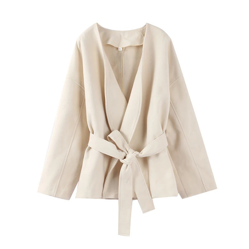 Women's elegant wrap jacket with waist belt, size