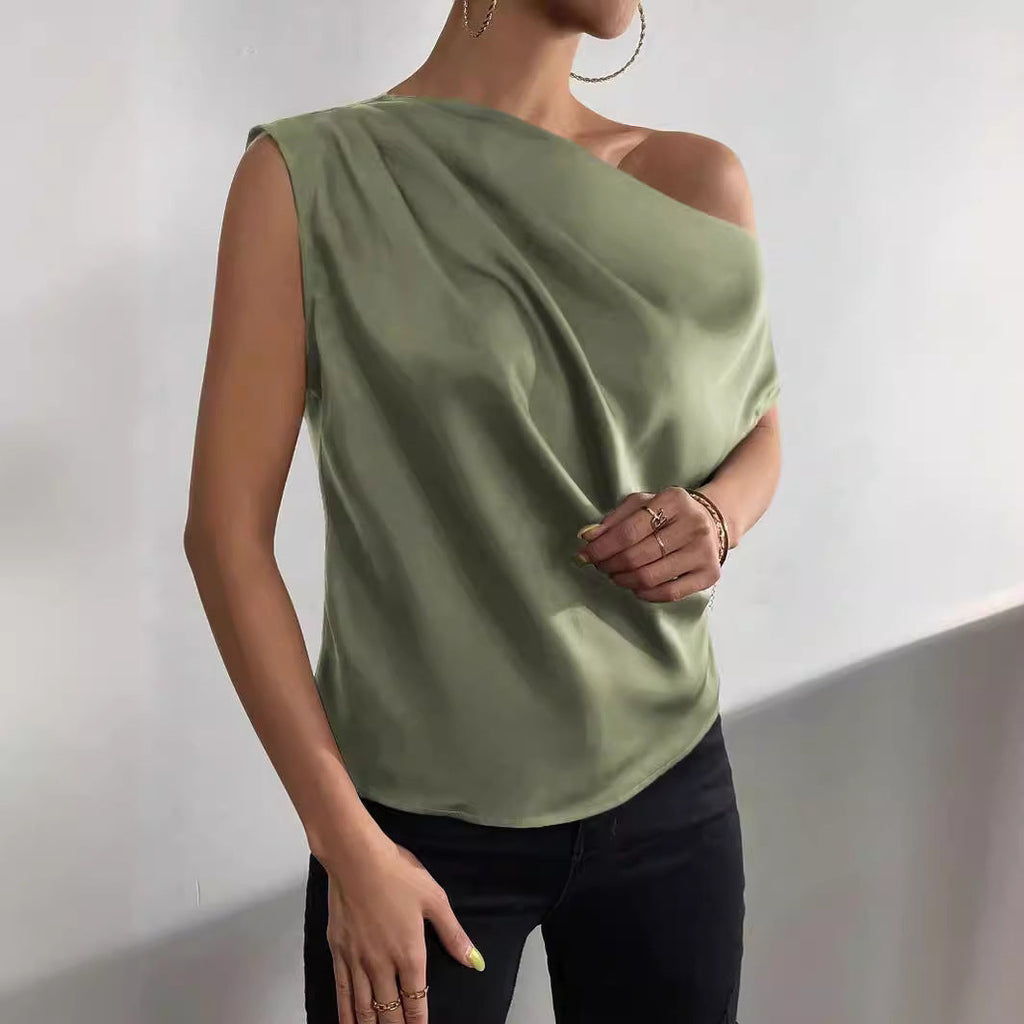 Women's asymmetrical top with draping and elegant cut, size