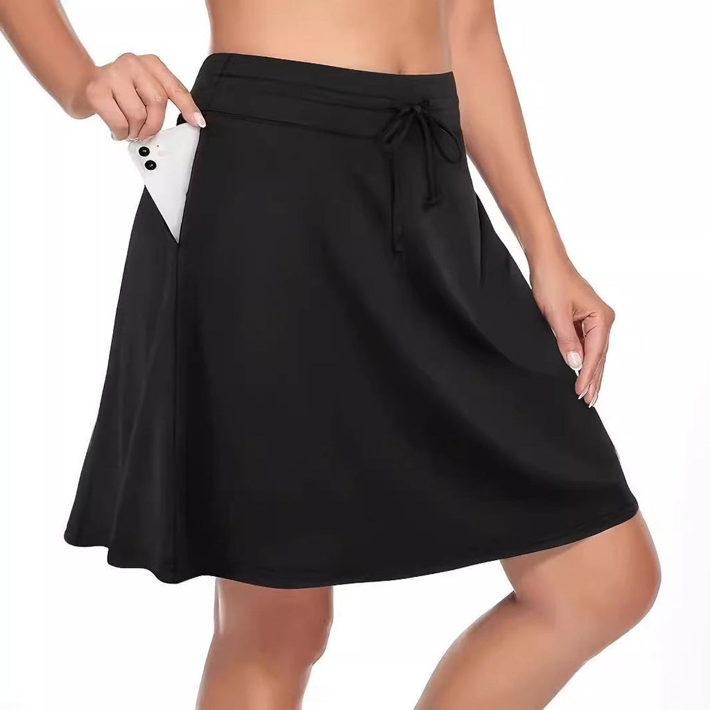 Women's sporty skirt with integrated shorts and practical smartphone pocket, size