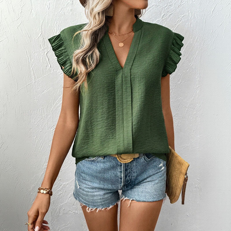 Women's blouse with voluminous ruffled sleeves and elegant V-neck, size [size missing]