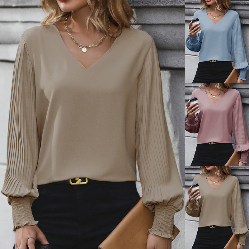 Damenbluse mit voluminösen Puffärmeln und elegantem V-Ausschnitt, Größe [size]