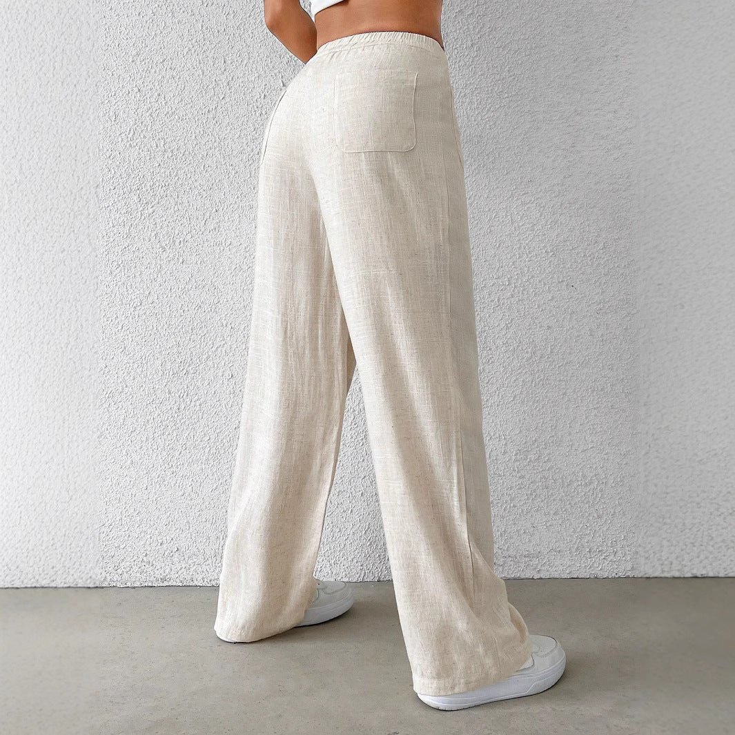 Women's wide linen trousers with elasticated waistband and practical pockets, size