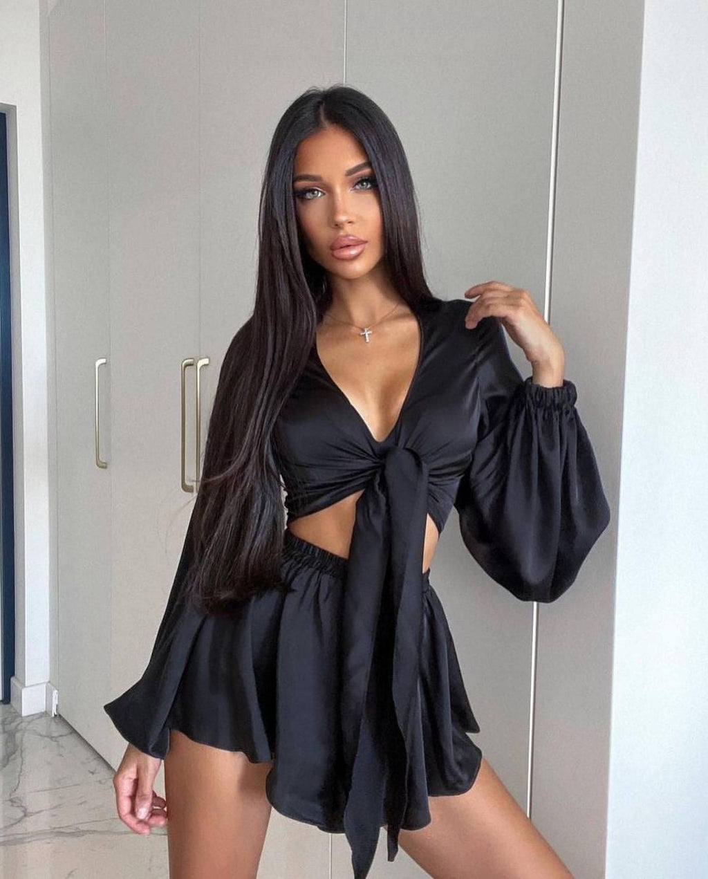 Women's fashionable set consisting of a light blouse and flowing skirt, size [size]