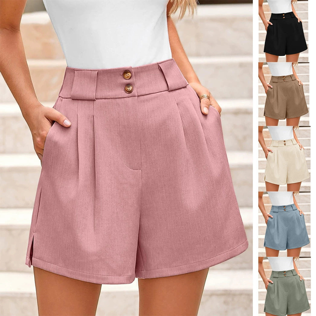 Women's elegant high-waisted shorts with button details and a wide cut
