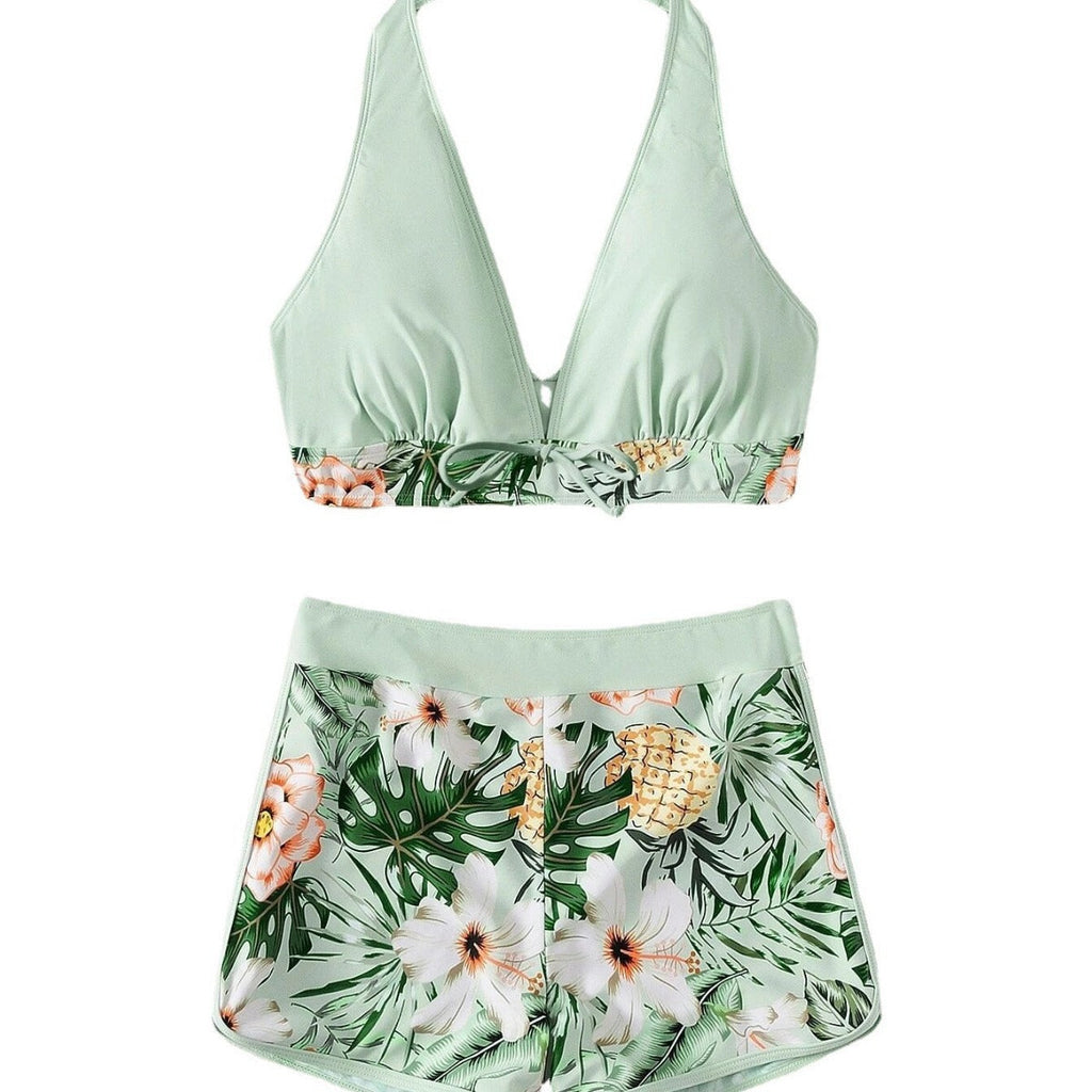 Women's sporty bikini set with woven top and patterned shorts, size [size]