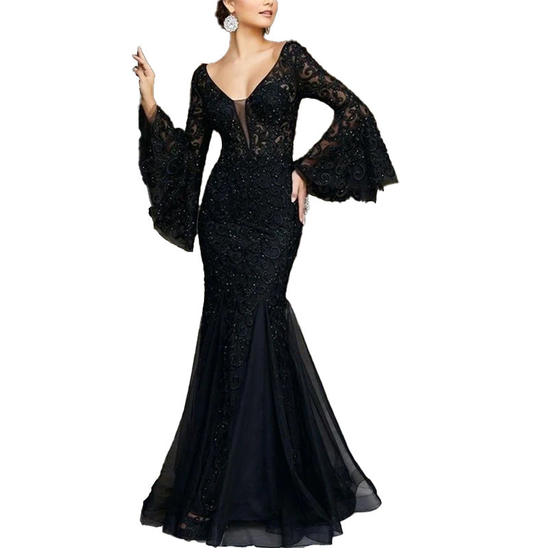 Women's figure-hugging evening dress with shimmering embellishments and elegant V-neck, size S