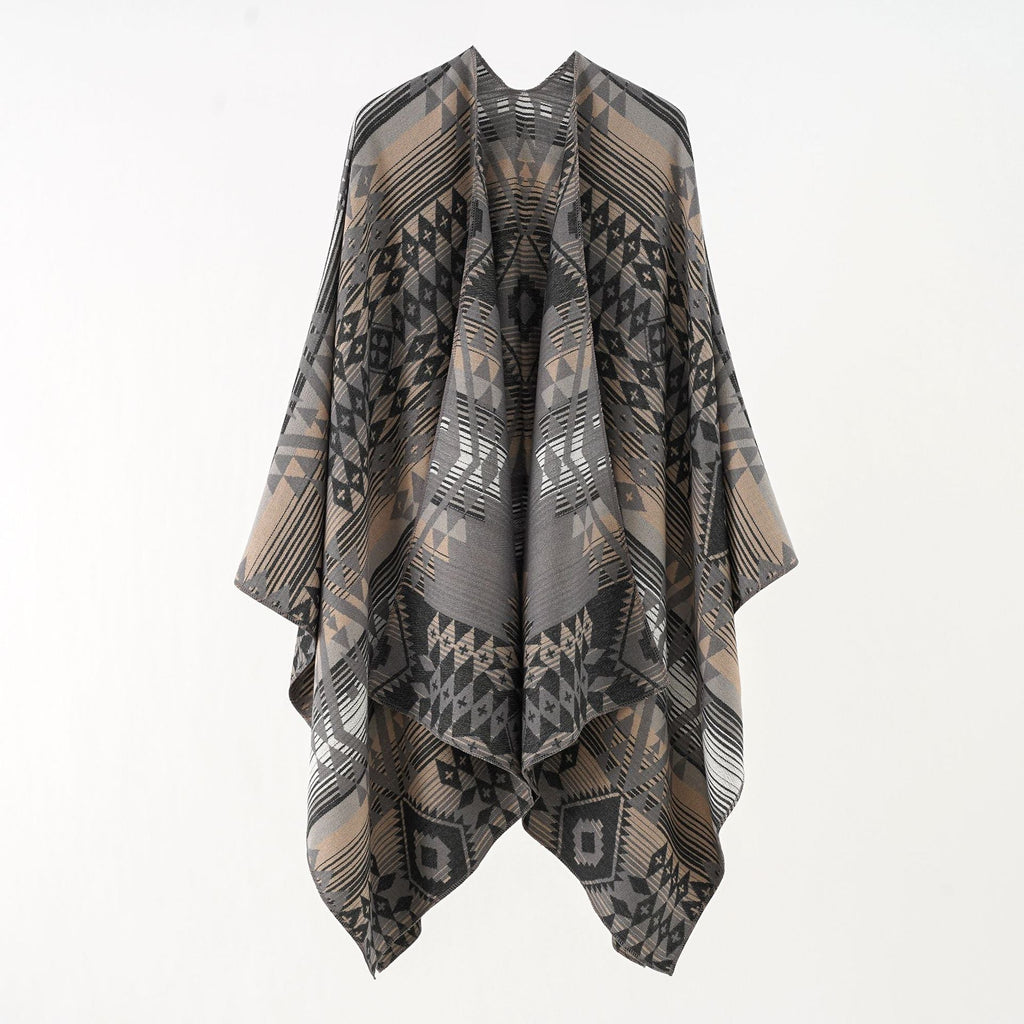 Women's geometric throw poncho with warm material and trendy pattern, size S