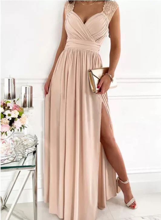 Glamorous ruffled evening dress with V-neck & slit
