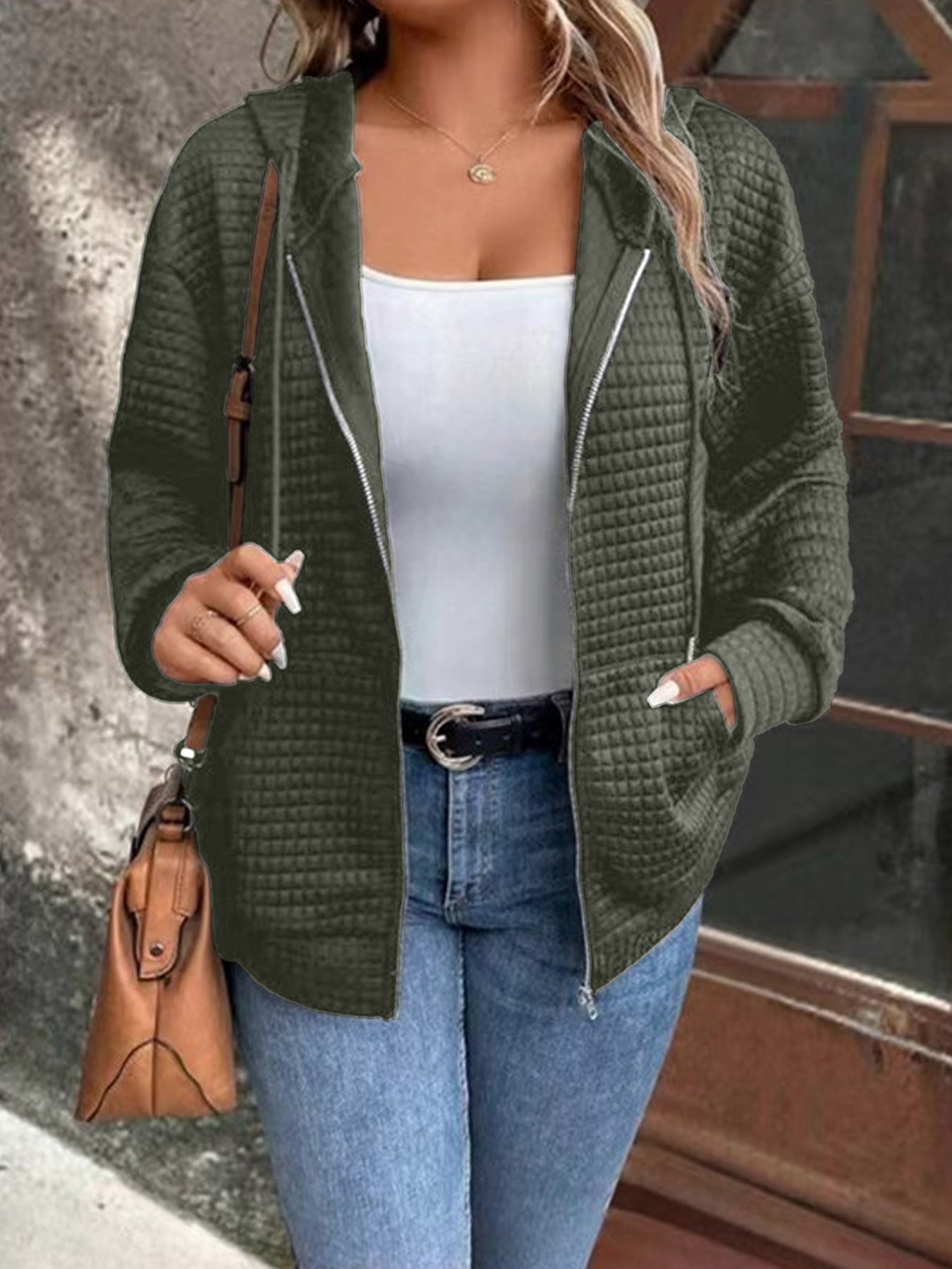 Women's loose-fitting hooded jacket with a textured waffle surface and practical pockets, size S