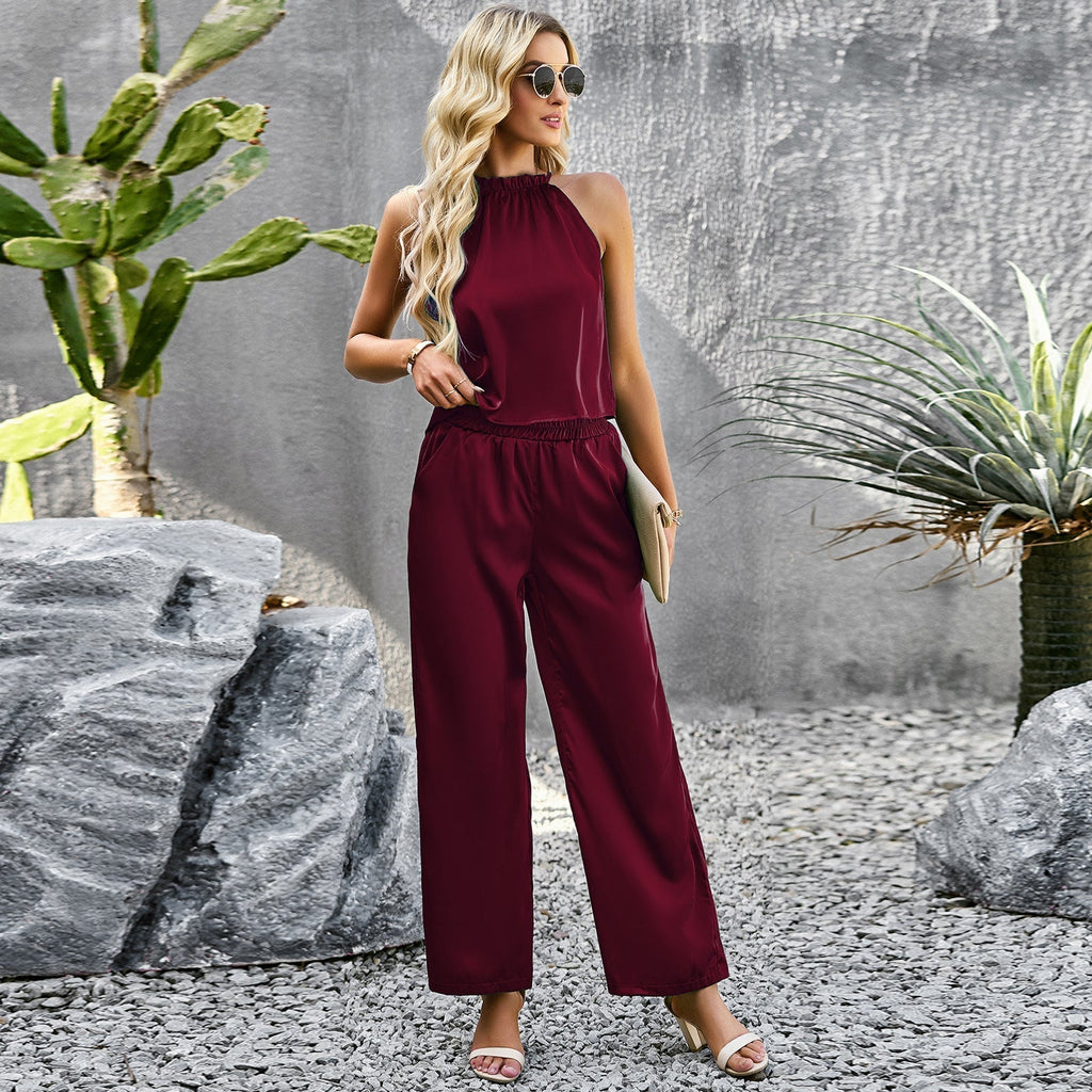 Women's elegant jumpsuit with flared leg and high collar, size