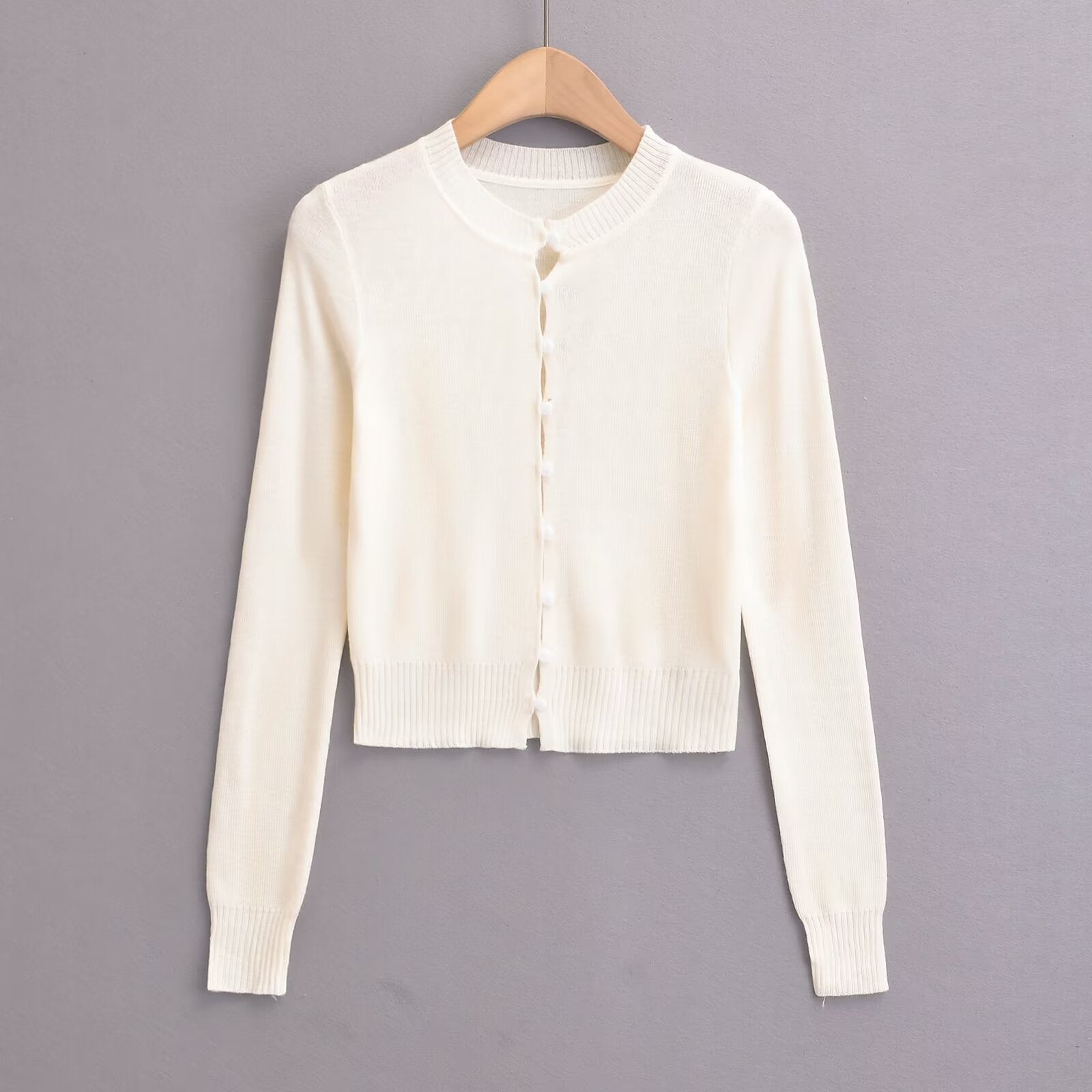 Women's cardigan with a fashionable round neckline and elegant button placket, size S