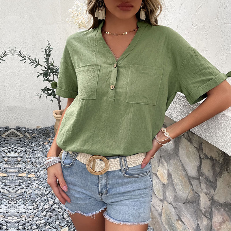Women's blouse with button-side details and a casual V-neck, size [size missing]