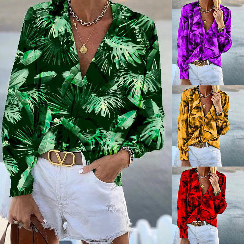 Women's blouse with floral pattern and deep V-neck, size