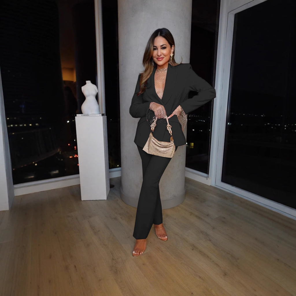 Women's elegant blazer and trouser suit with a chic cut, size