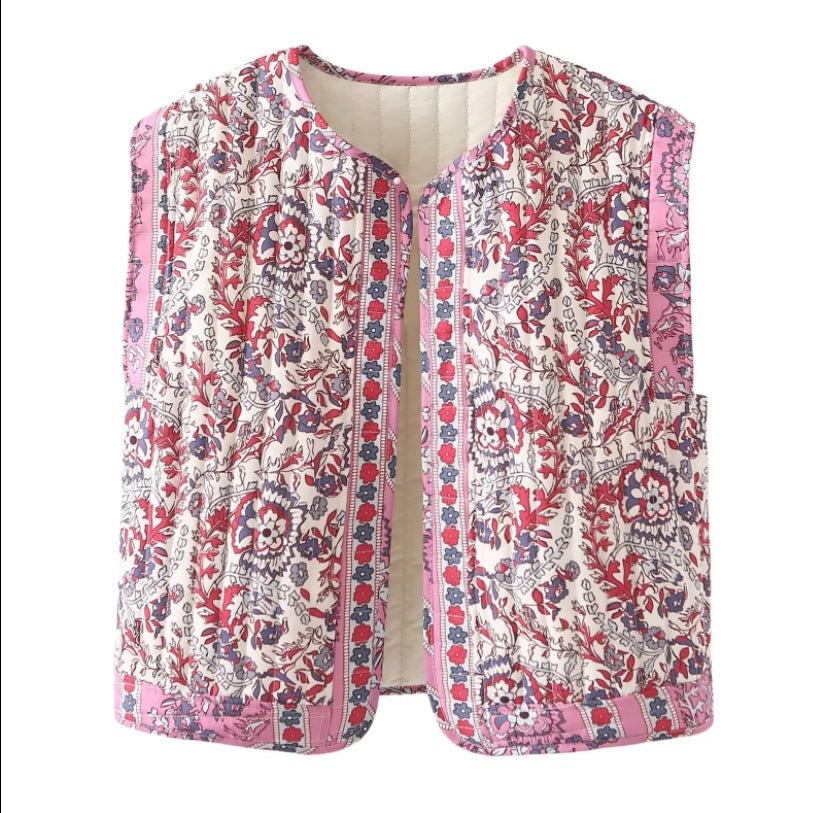 Women's quilted vest with floral design and practical pockets, size S