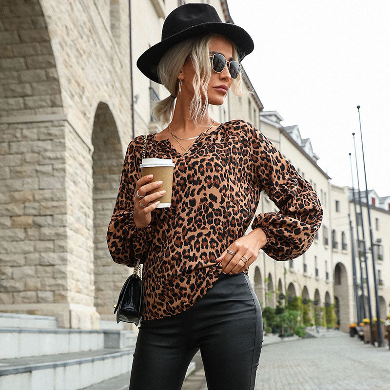 Women's blouse with unique leopard print and voluminous sleeves, size [size missing]