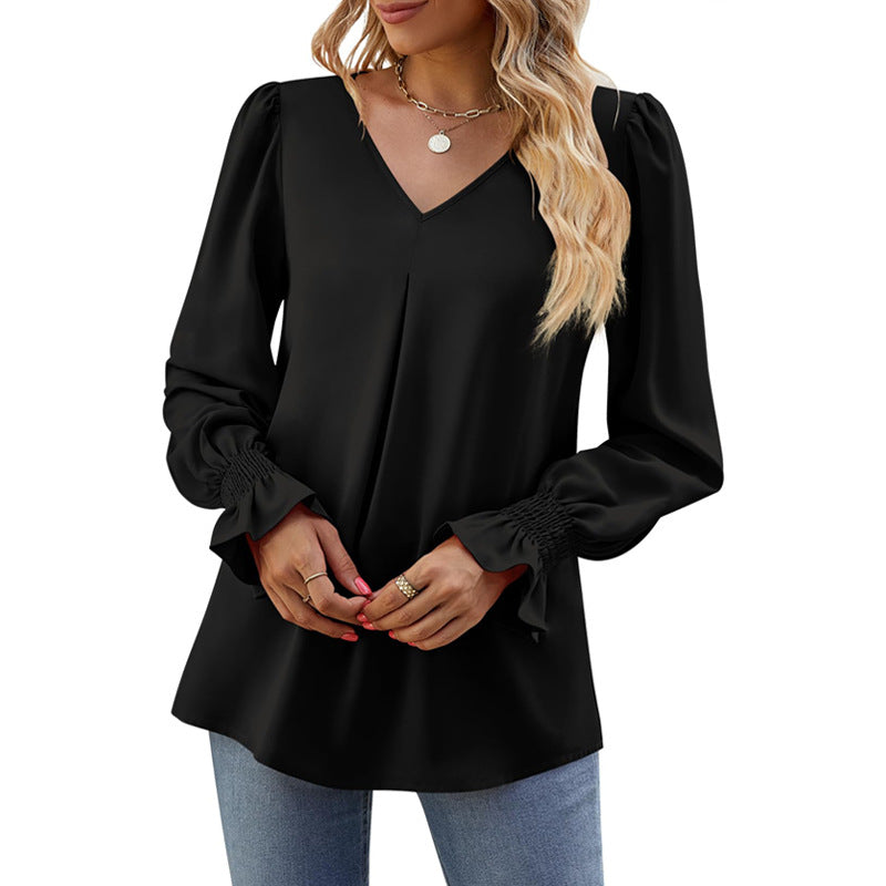 Valenzora | Solid color V-neck top with puff sleeves and long sleeves