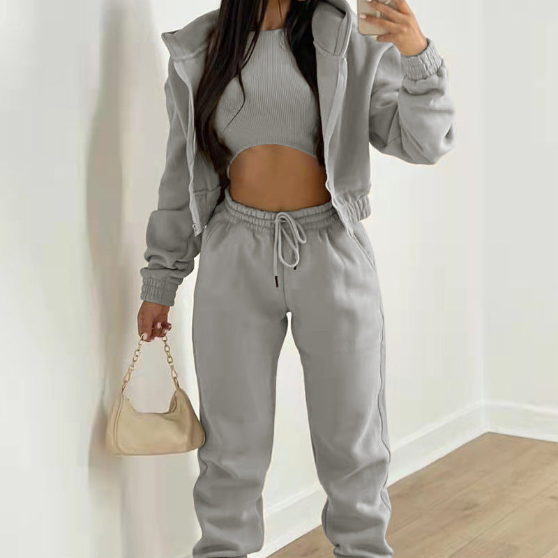 Women's sporty two-piece set with short top and casual jogging pants, size