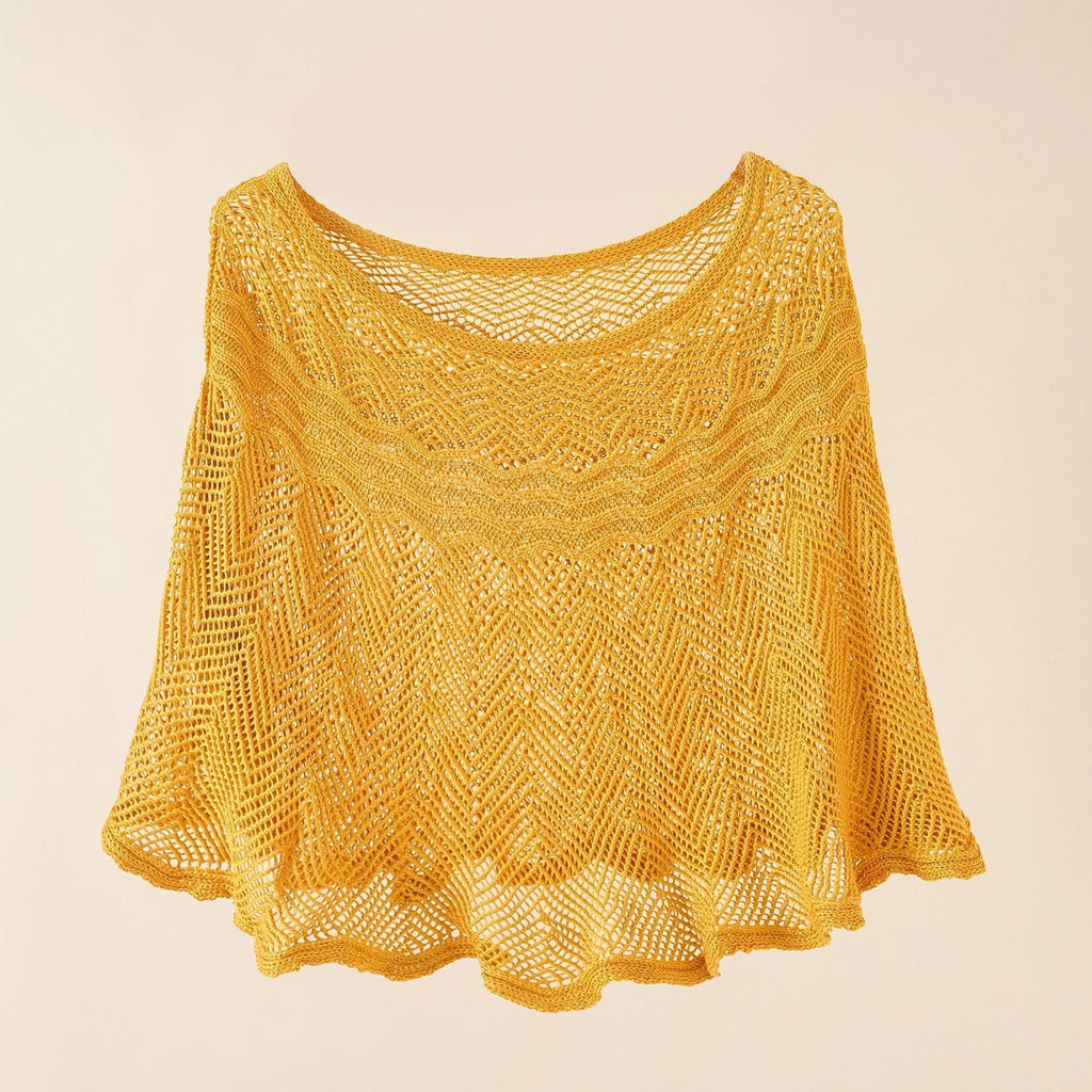 Women's airy knitted poncho in a modern design, size