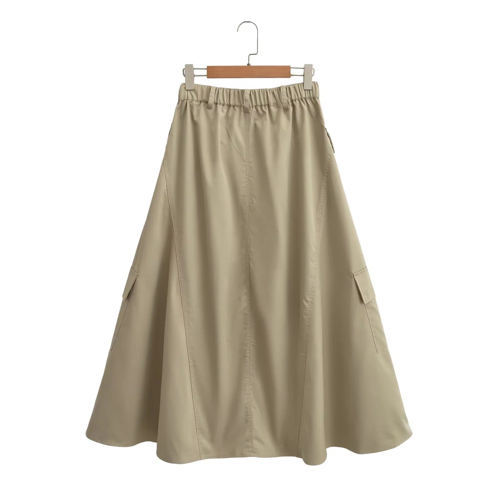 Women's midi skirt with practical cargo pockets and elegant cut, size S