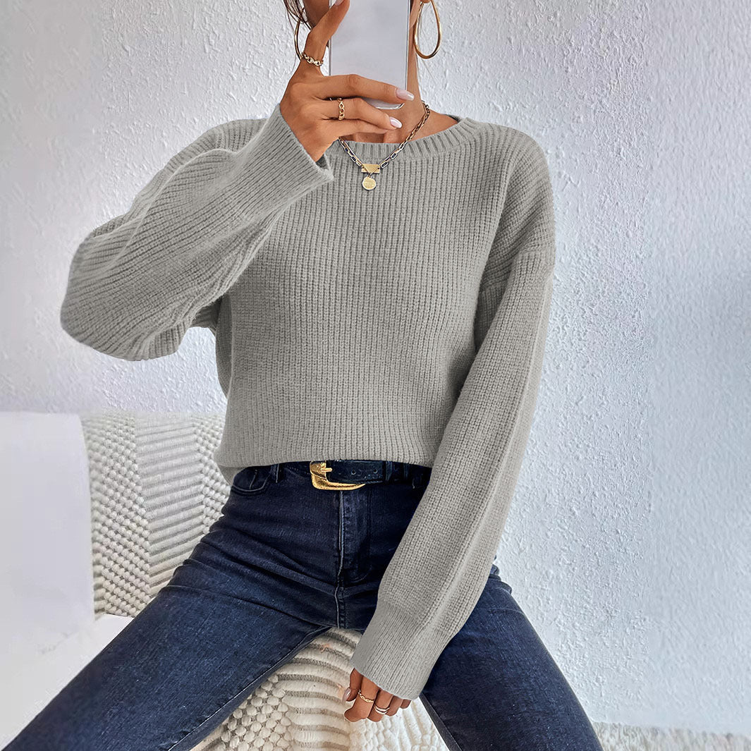 Women's casual knit sweater with a relaxed fit and elegant ribbed details, size [size]
