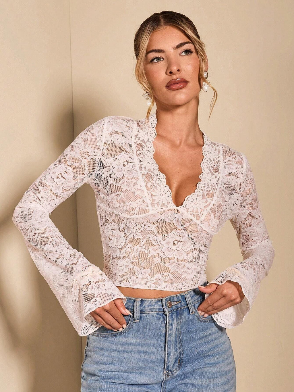 Valenzora | Transparent lace V-neck fitted bell-sleeve top