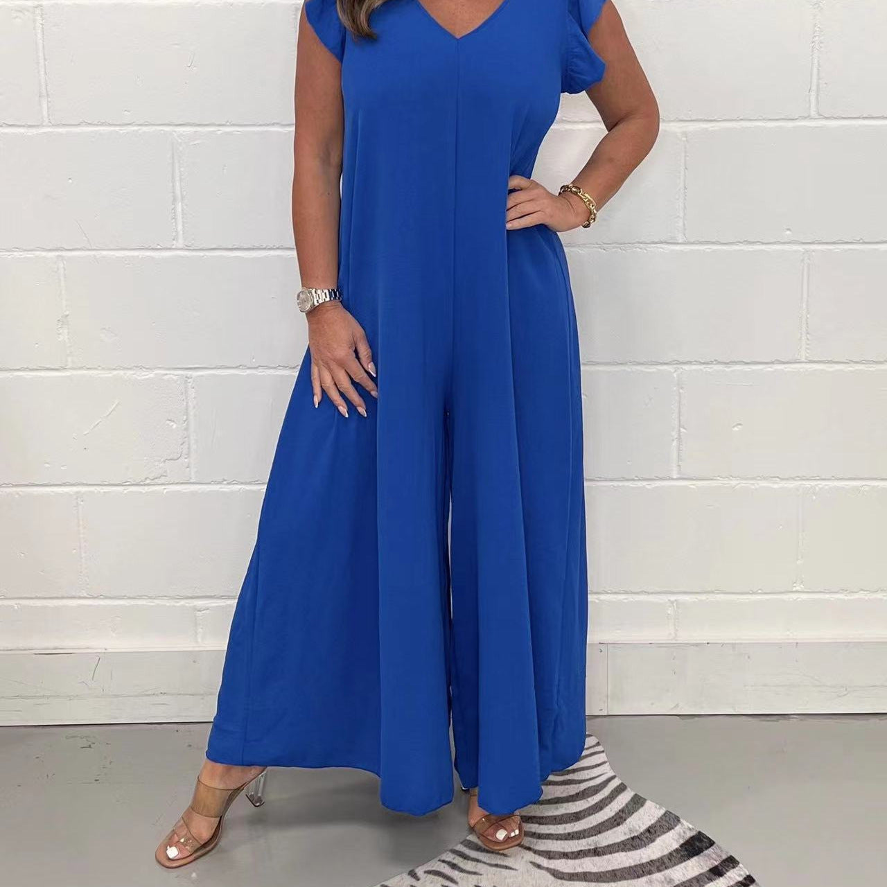 Exklusiver Damen-Jumpsuit mit voluminösen Rüschenärmeln und V-Ausschnitt, Größe S