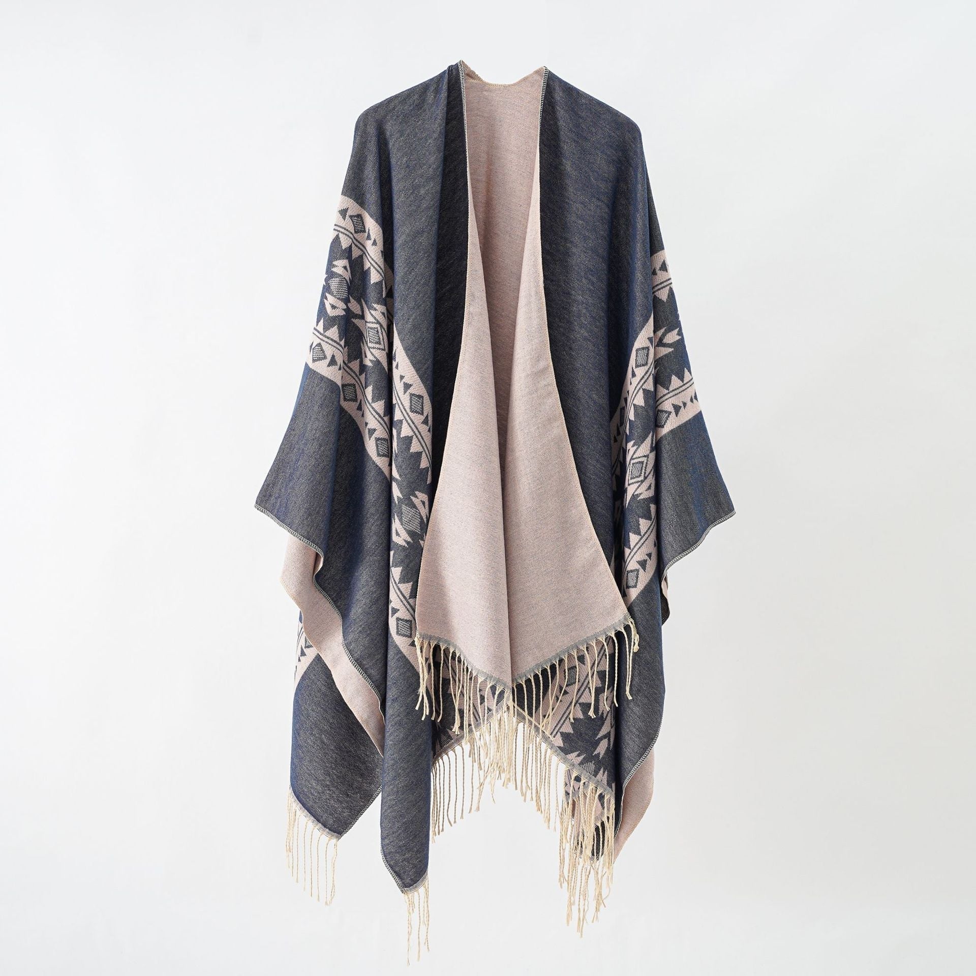 Women's elegant knitted poncho with artistic fringe and floral accents Valenzora