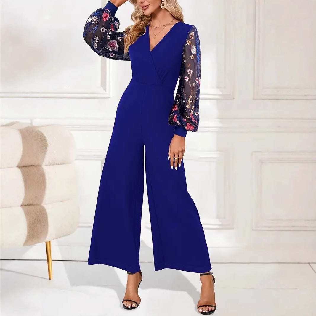 Women's elegant jumpsuit with floral lace sleeves and wide leg, size S