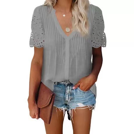 Women's blouse with sophisticated fabric details and lace sleeves, size