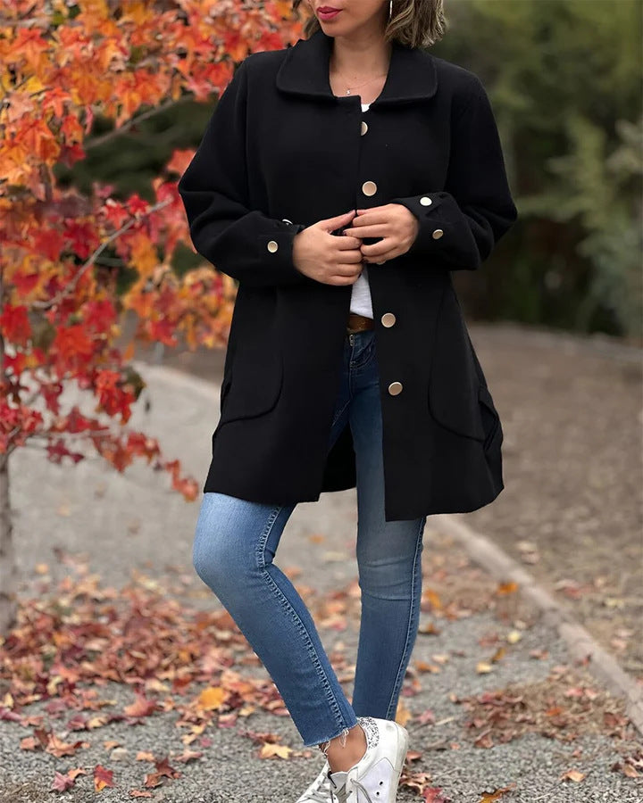 Women's comfortable oversized coat with large pockets and button details, size S