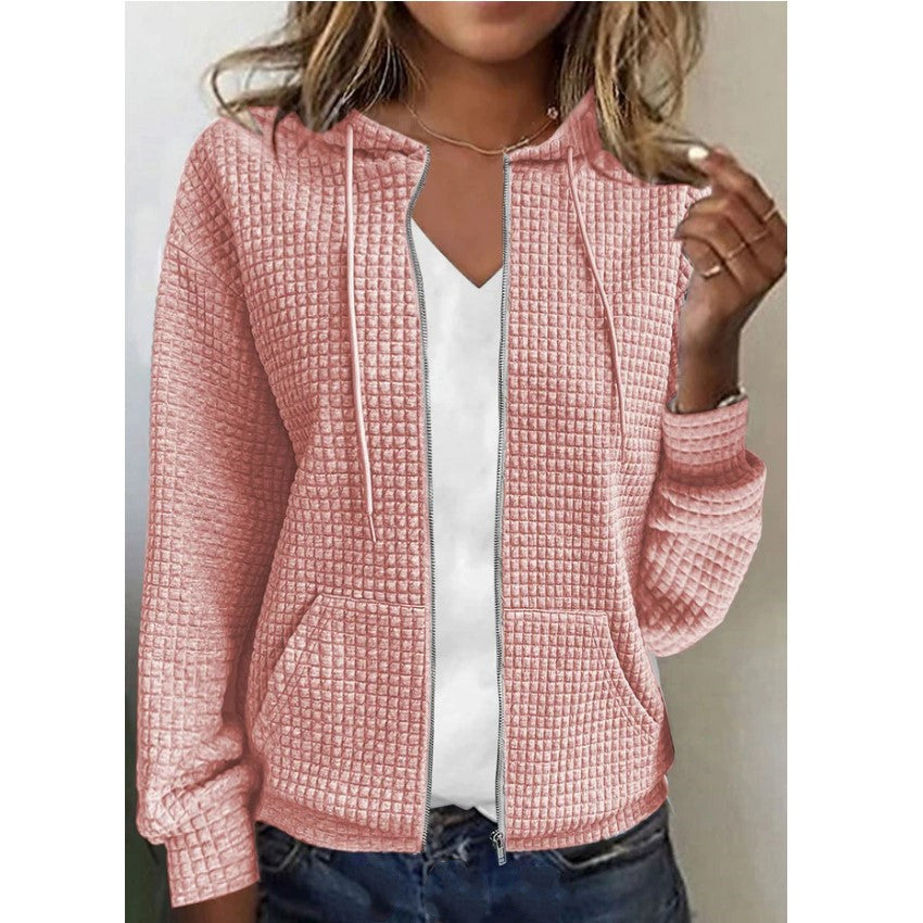 Women's waffle-textured hooded jacket with practical pockets and a modern cut, size S