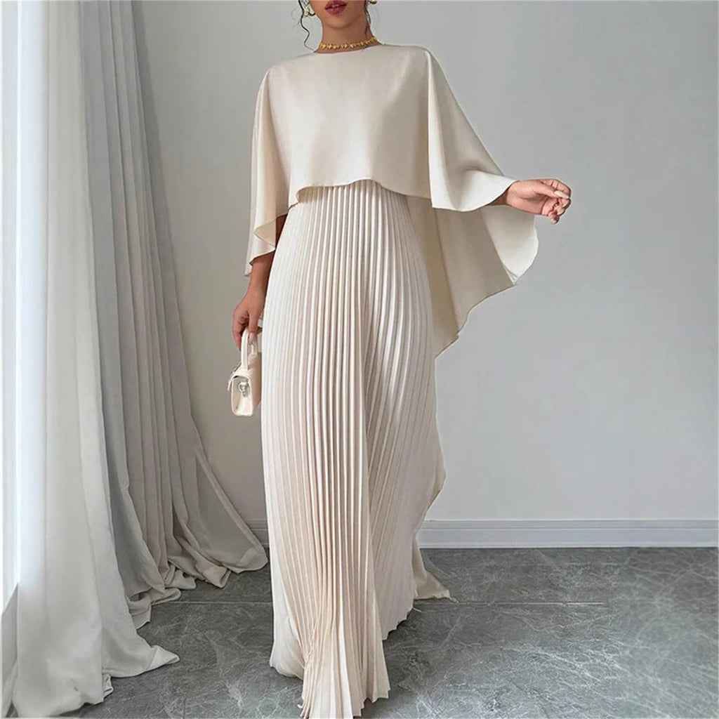 Valenzora | Elegant long dress with batwing sleeves, pleated asymmetrical design, and flowing fit