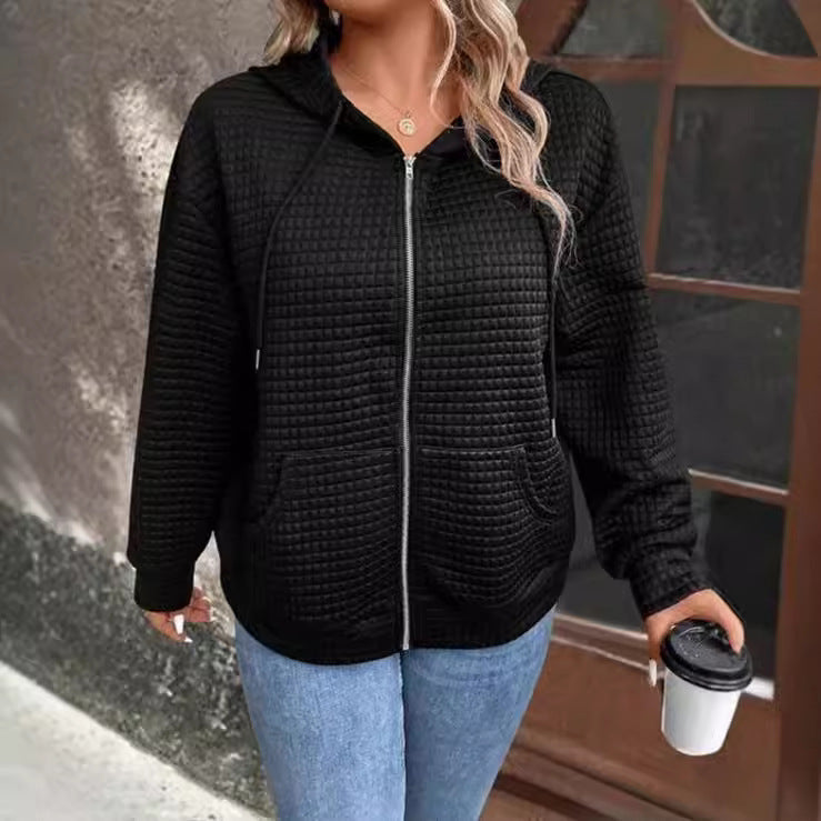 Women's loose-fitting hooded jacket with a textured waffle surface and practical pockets, size S