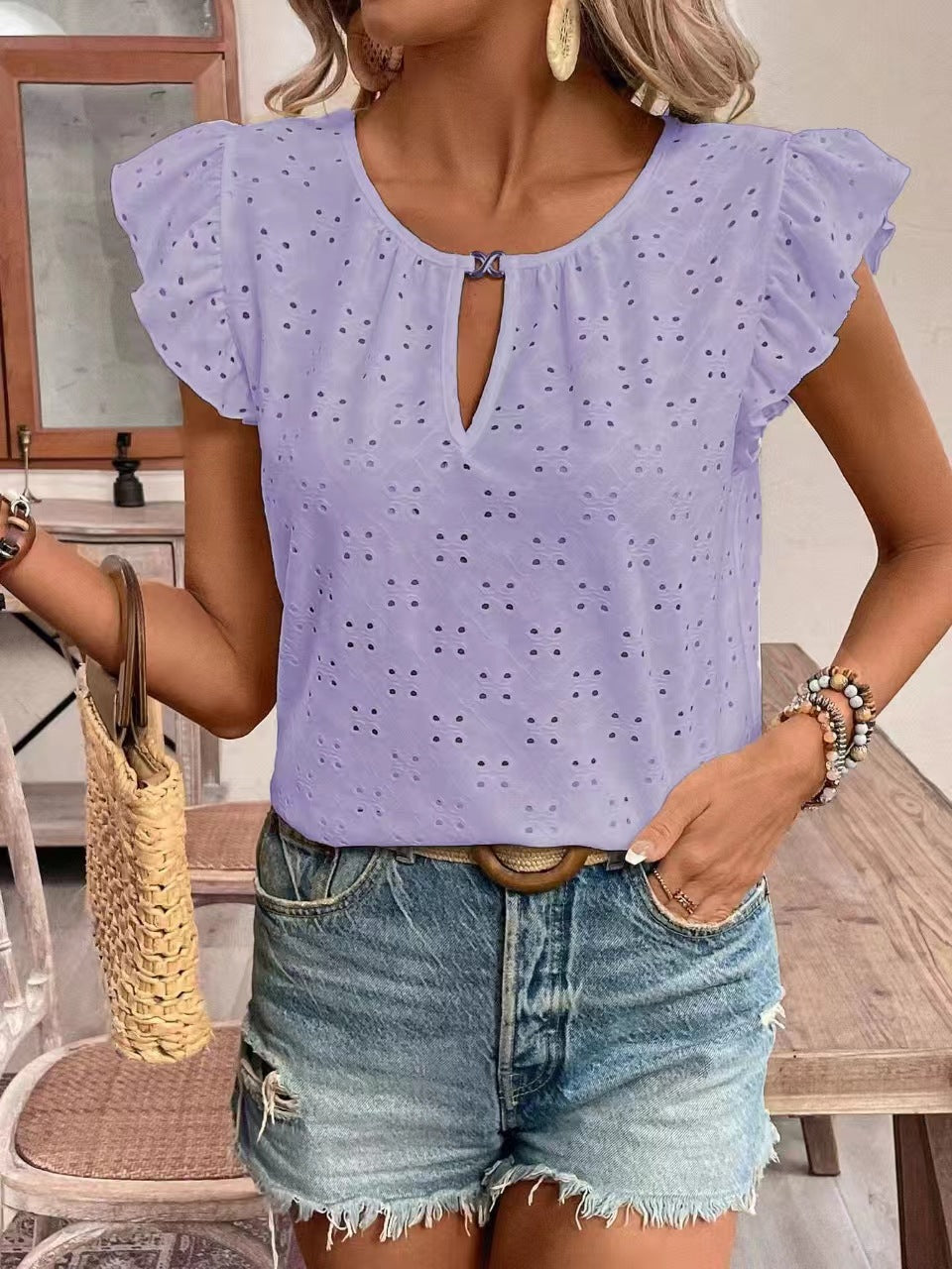 Women's blouse with ruffle details and eyelet embroidery, size