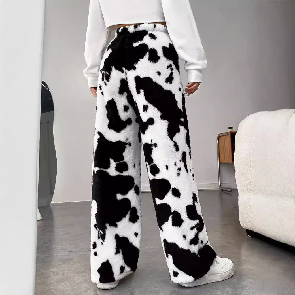 Women's fleece trousers in a trendy cow print, size