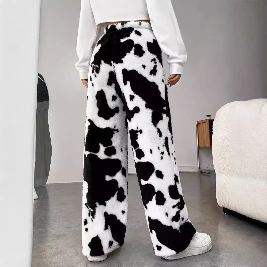 Women's fleece trousers in a trendy cow print, size