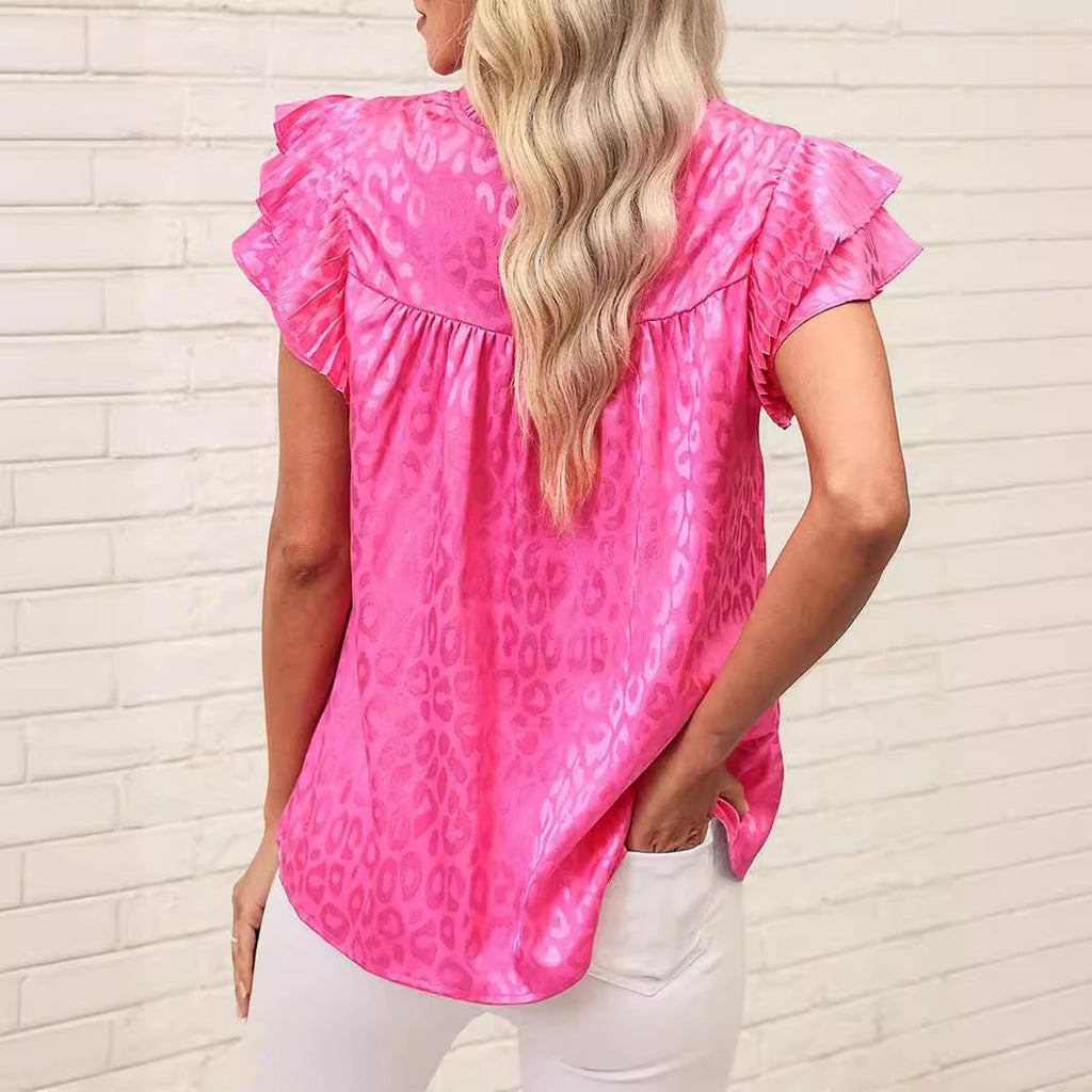 Women's blouse with fashionable ruffle details and elegant leopard print, size [size missing]