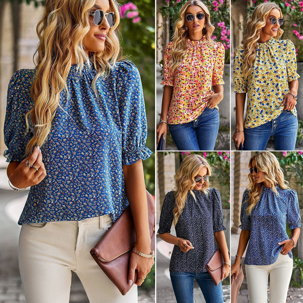 Women's blouse with playful floral design and puff sleeves, size