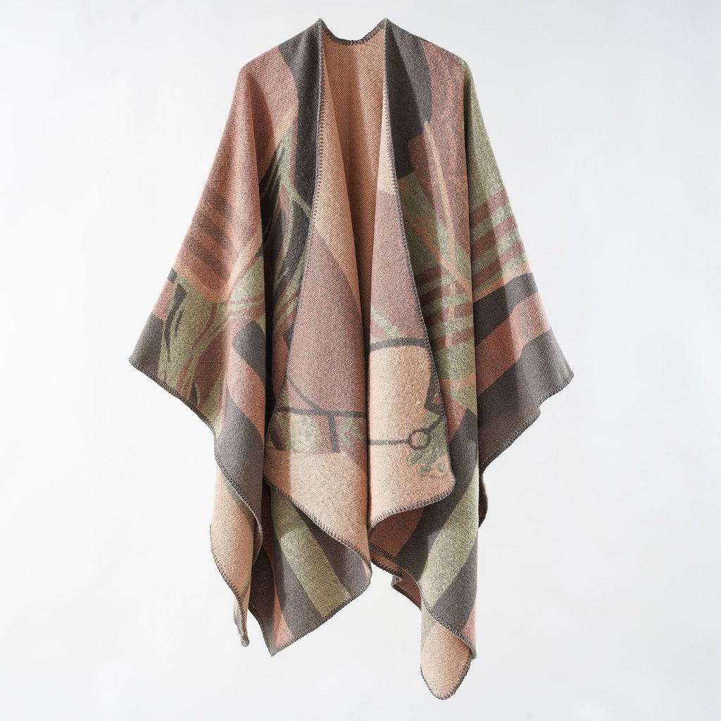 Women's elegant knitted poncho with artistic pattern and fine fringe, size Valenzora